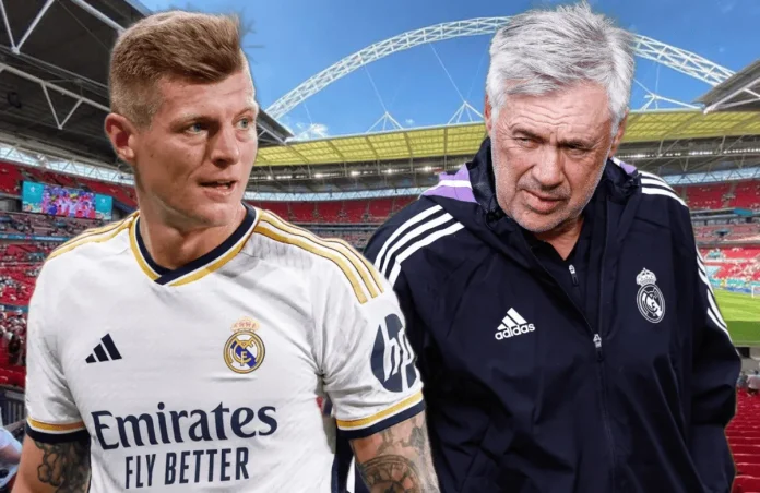 Kroos y Ancelotti charlan sobre el césped de Wembley